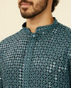 alt message - Manyavar Men Teal Blue Chikankari Kurta Set image number 1